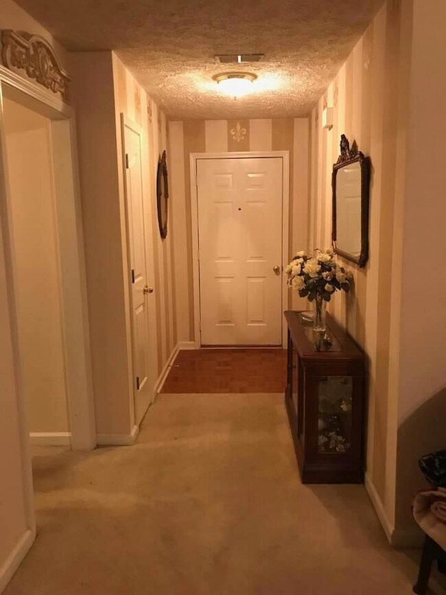 So nice to walk in to an actual foyer, with plenty of room for shoes, a coat rack... you could even install a built-in shelving unit if you wanted to!
