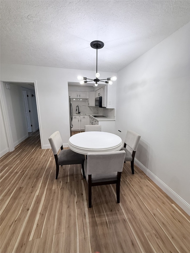 Open dining area conveniently located off the kitchen for easy flow.