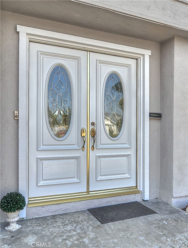 Custom Double Entry Doors with Beveled Glass