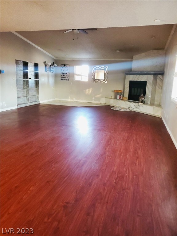 Huge great room features wood burning fireplace an