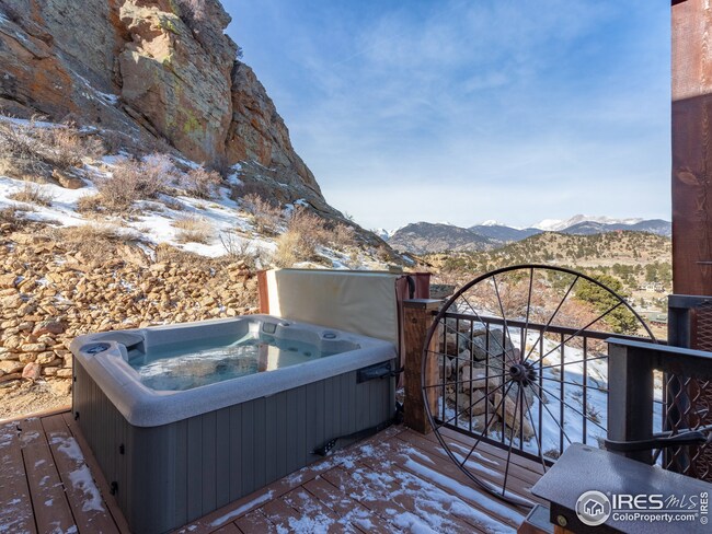 Private hot tub overlooking the Estes Valley and Snow-Capped peaks