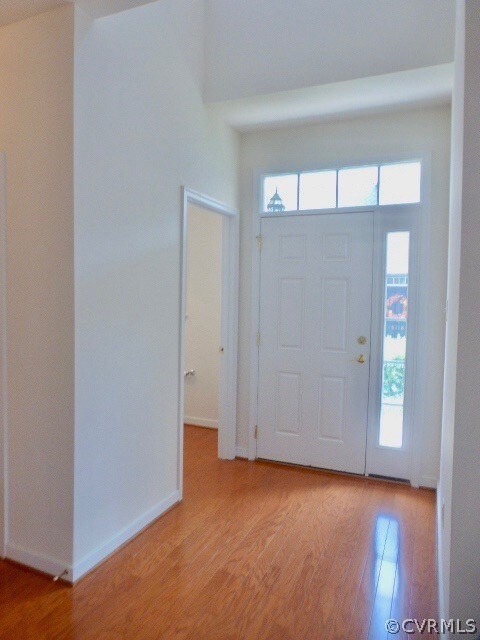 Foyer entrance with half bath