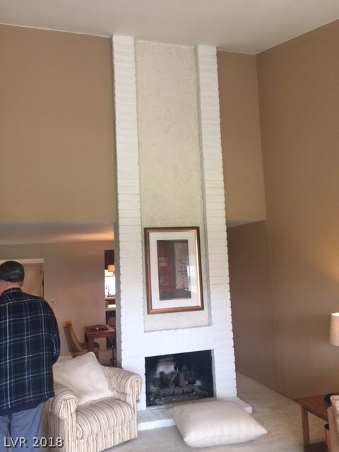 Dramatic two story fireplace.