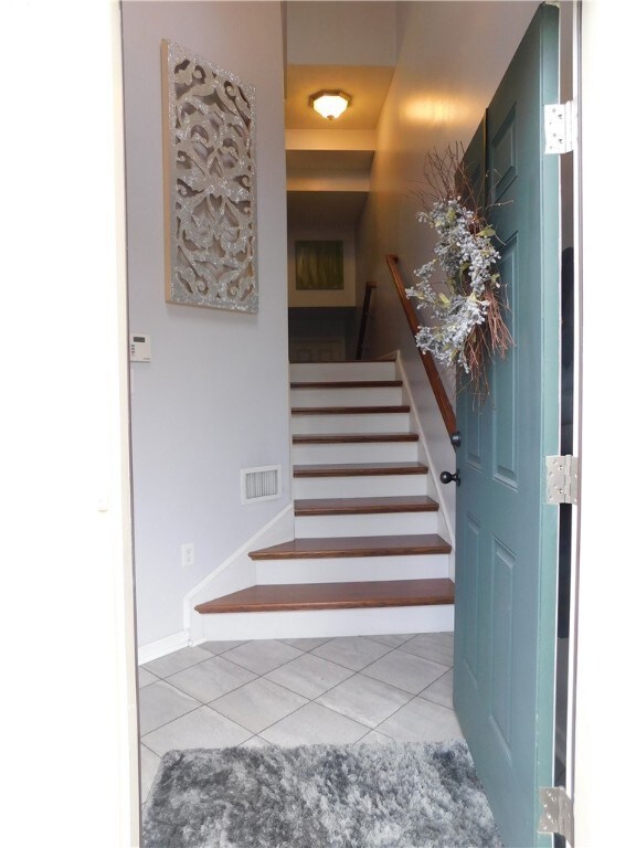 The entry makes a statement with the new flooring.