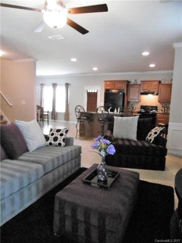 Living room looking toward kitchen and dining area