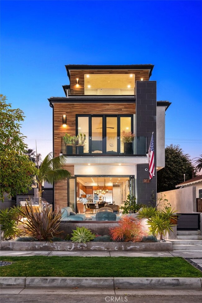 Porclenosa tile facade, accent lighting, and gorgeous landscaping, make this home a standout amongst the neighborhood.