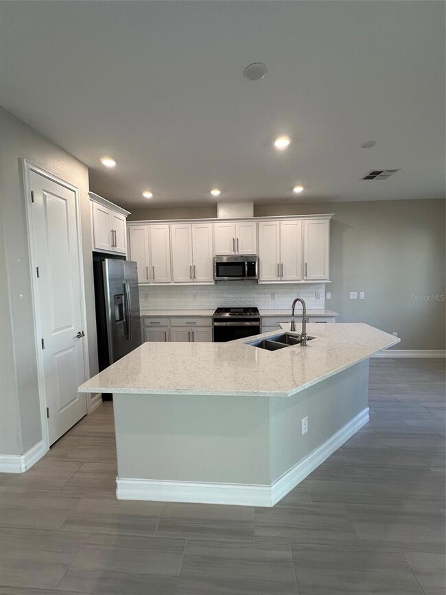 4725 Ancona Way, Wesley Chapel, FL 33543 - photo 7