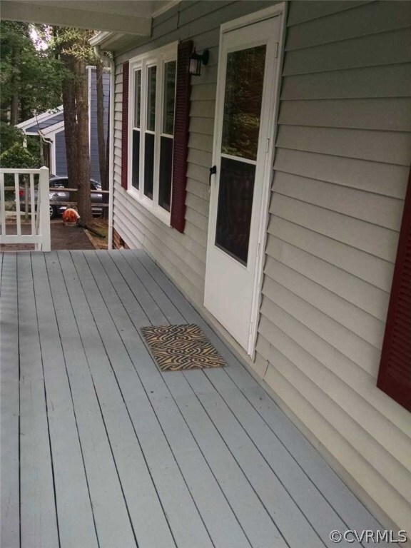 The front porch welcomes you home. Pull up a chair