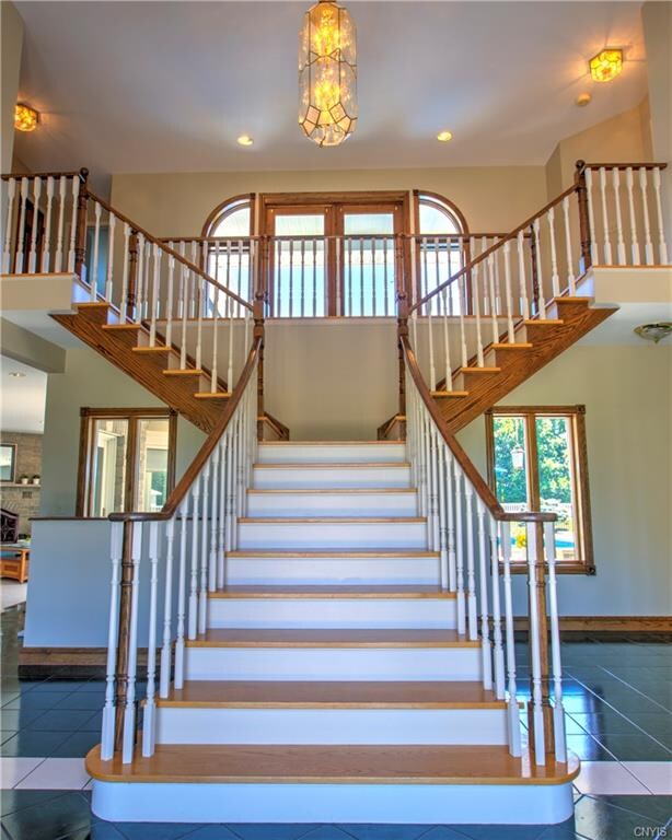 Imperial Staircase in the Foyer leads to the Upper