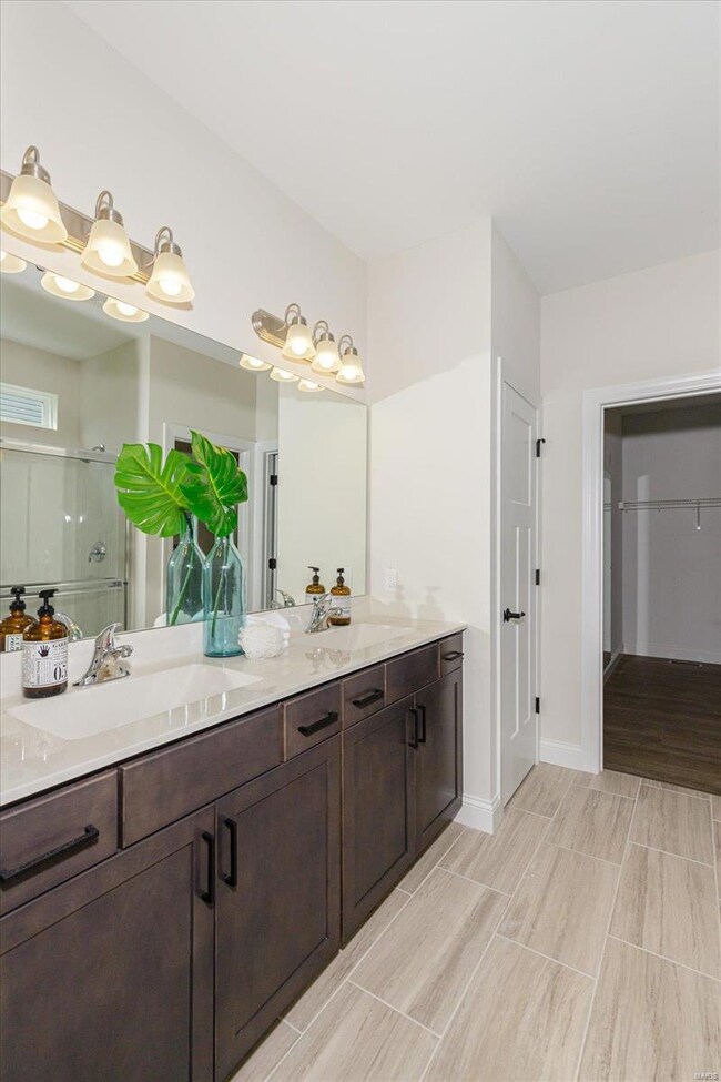 Master Bath with Double Bowl Vanities
