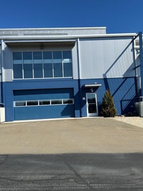View of front of house with central air condition 