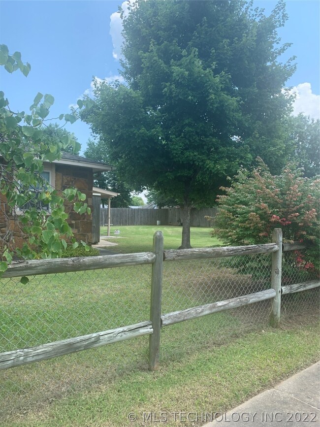 Trees, shrubs, great backyard.