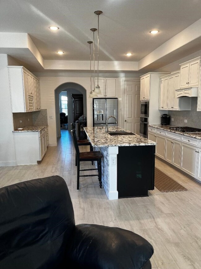 View of Kitchen from Den