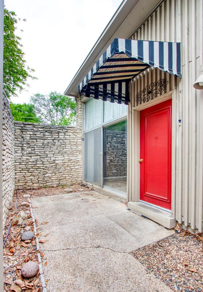 Property entrance featuring a patio