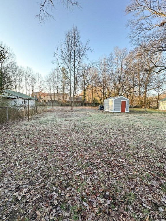 View of yard with a shed