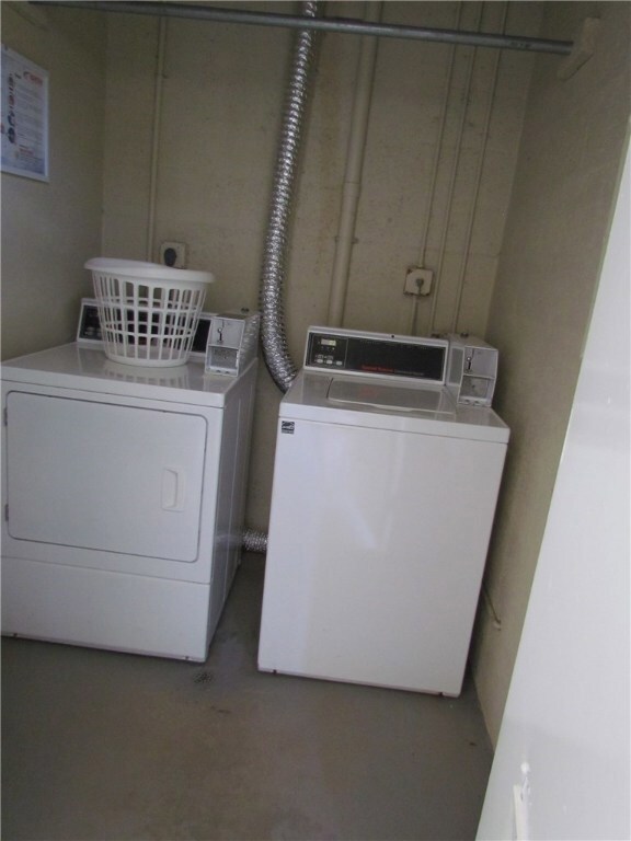 Laundry room is just outside the condos front door