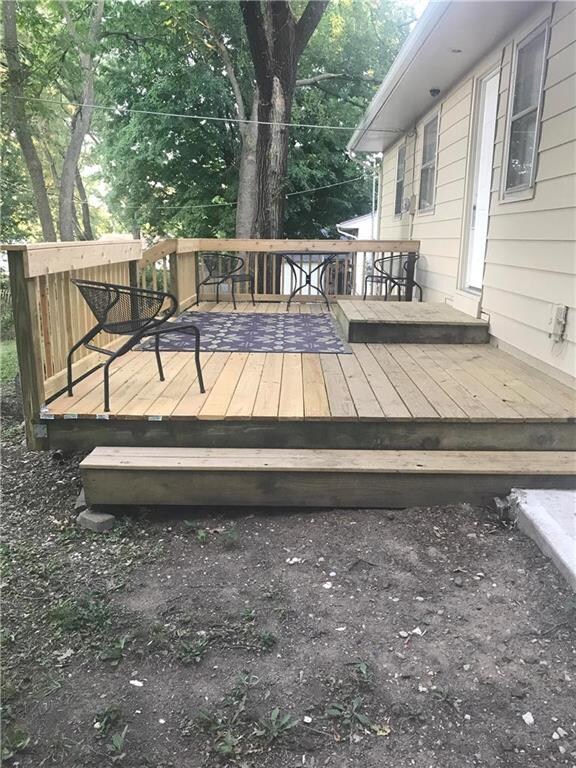 Large deck off back with railing. Sit and enjoy un