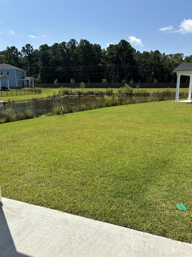 View of yard featuring a water view