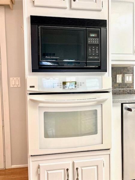 Built-in oven and microwave save cabinet space for storage