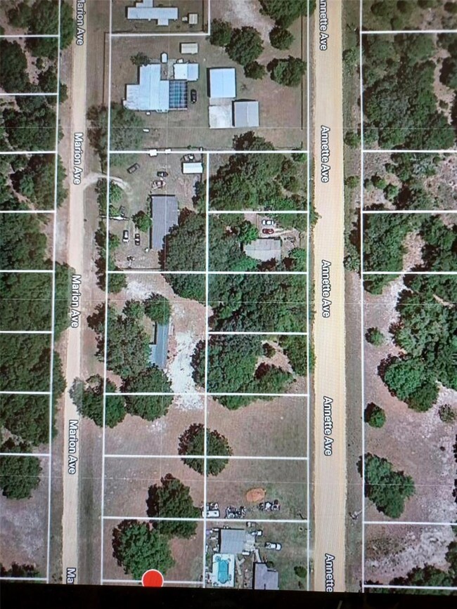 There are several homes surround the lot.