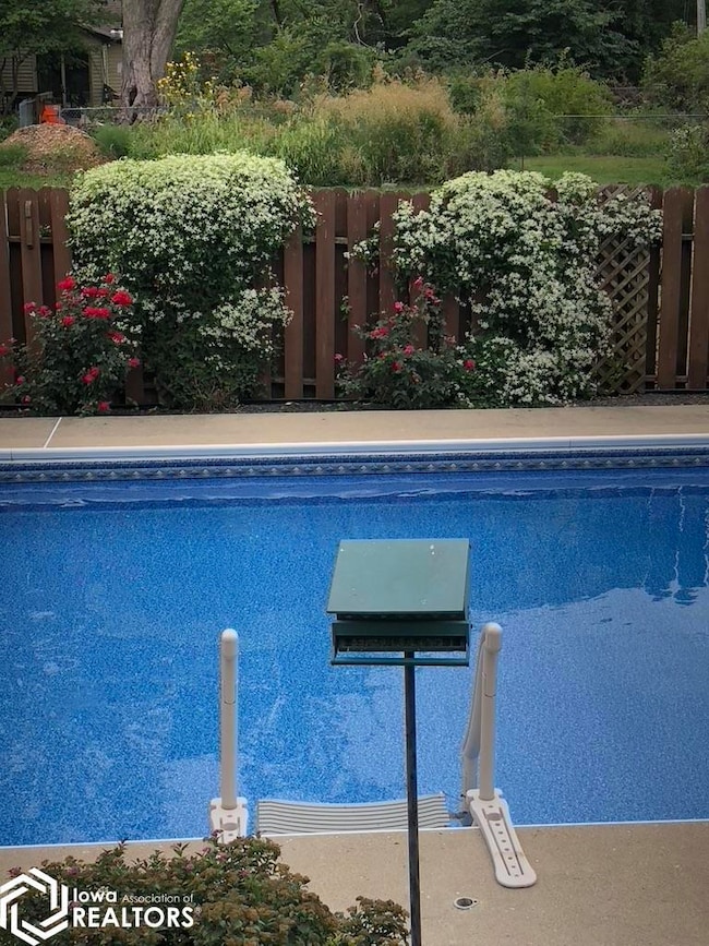 Pool with perennial landscaping view