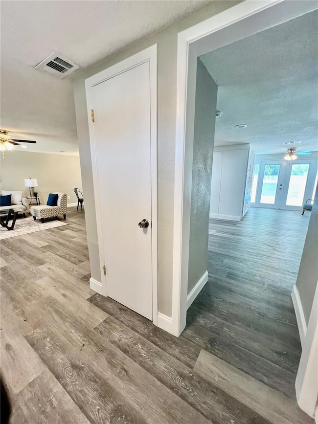 FRONT ENTERANCE WITH VIEW OF LIVING ROOM AND FAMILIY ROOM FROM FRONT DOOR