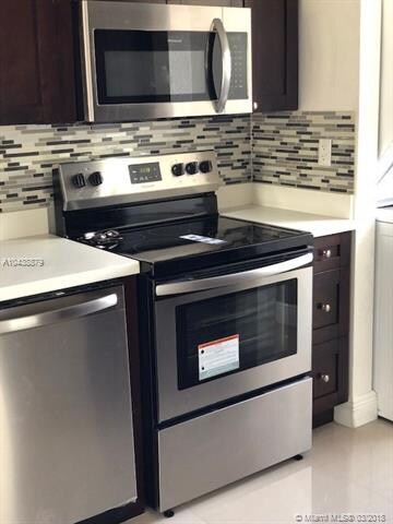 BRAND NEW  STAINLESS STEEL STOVE