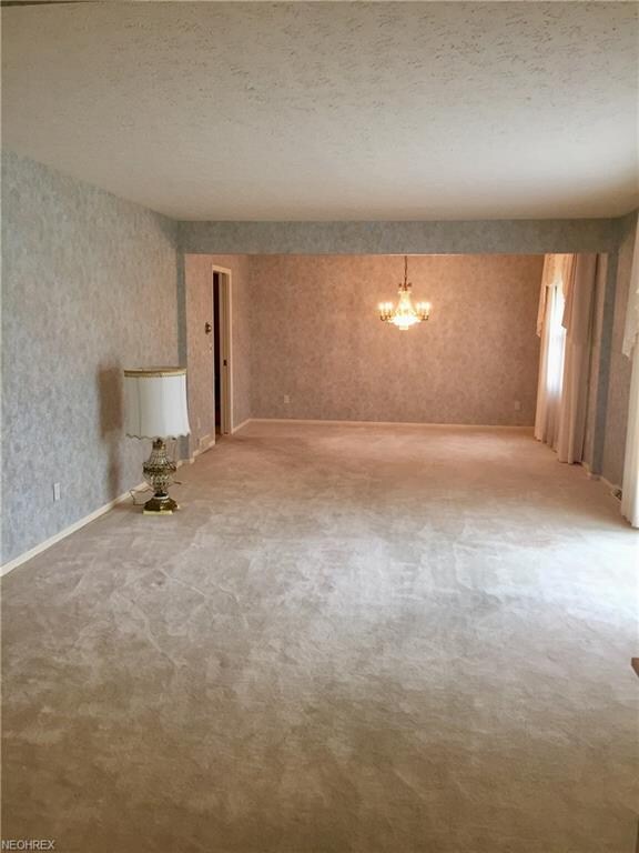 Large Formal Living room with Custom made Drapes