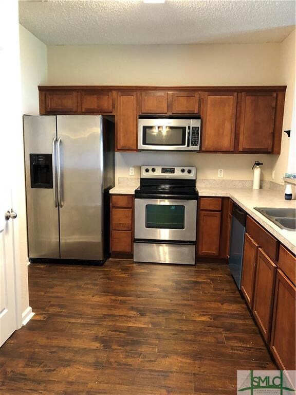 Kitchen has stainless steel appliances and good si