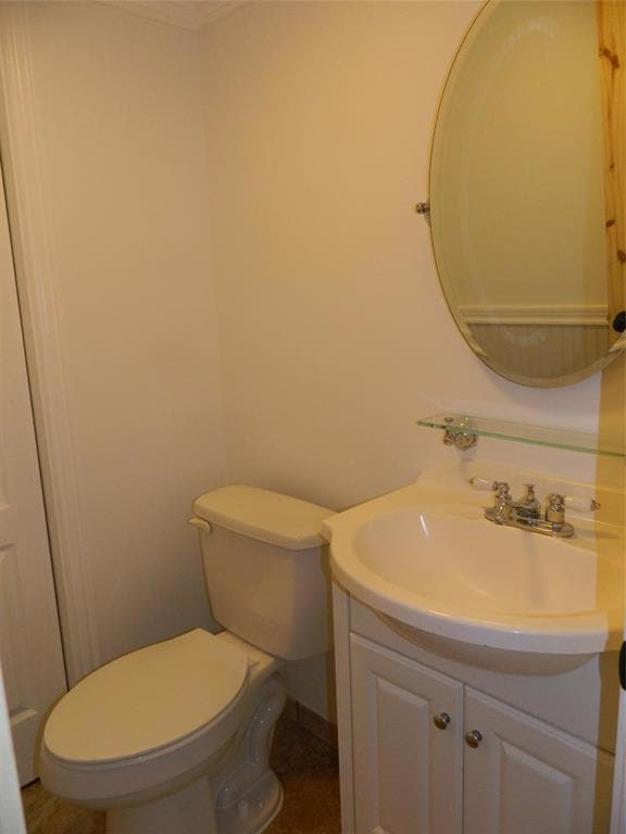 Half bathroom off of kitchen and living area. Also