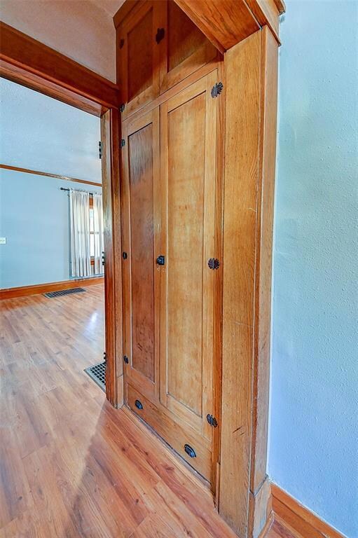 Built-ins between living room hall and kitchen
