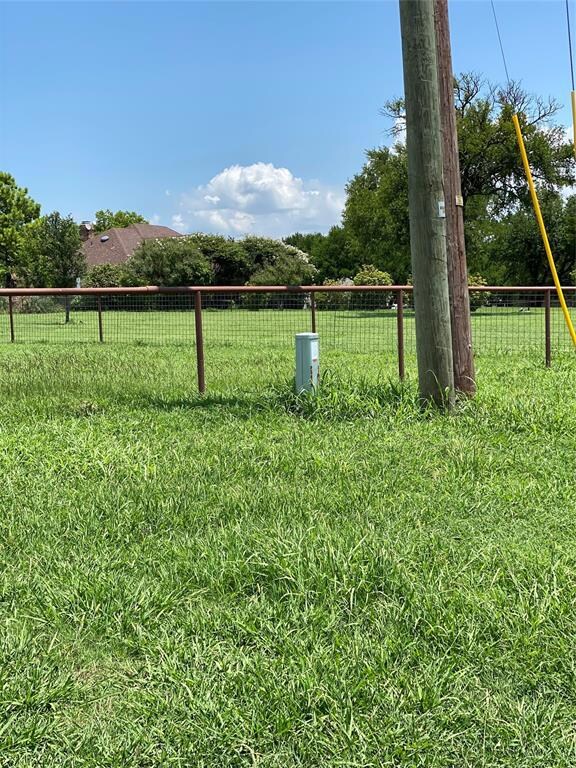 pipe fencing is all along the back and side of property