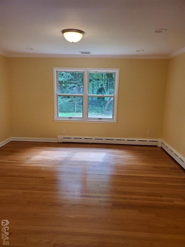 Formal Dining Room with hardwood flooring