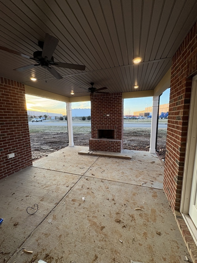 Photo of jumbo covered patio with fireplace of the ACTUAL house. Taken 2/4/2024