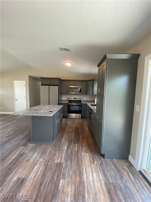 Kitchen with appliances with stainless steel finis