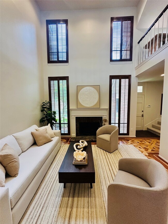 Light-filled family room with 20-foot ceilings, ta