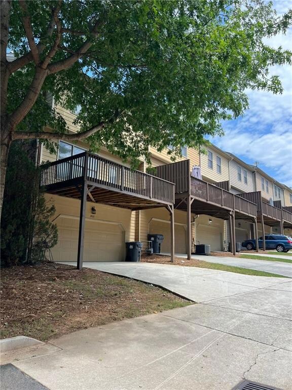 View of property featuring a garage