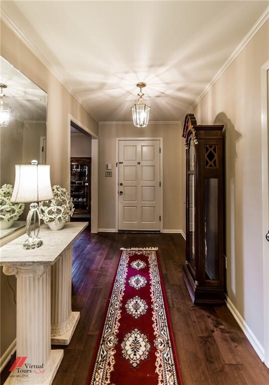 Entry with wood floors