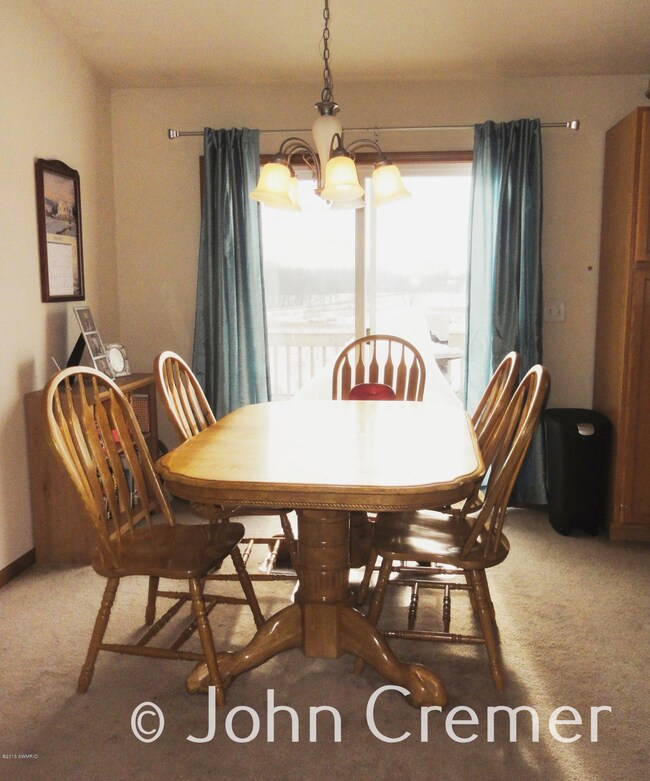 Dining Area with Sliders to Deck