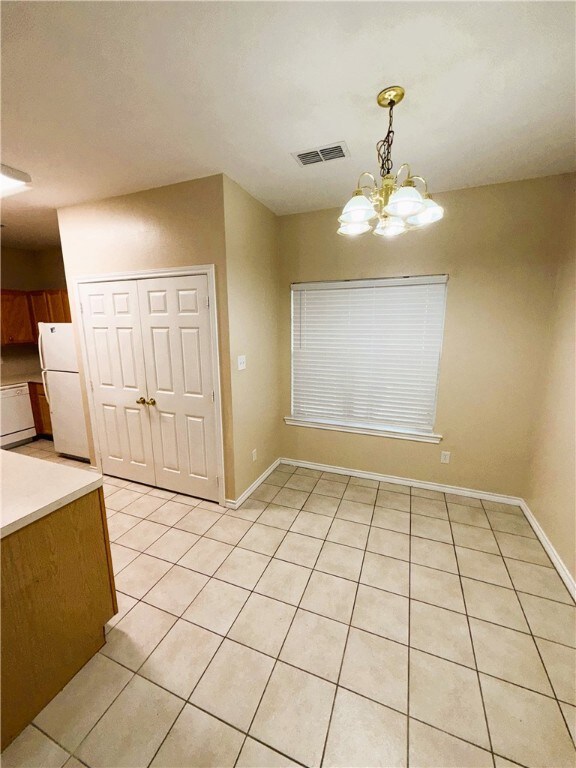 Unfurnished dining / breakfast area with an inviti