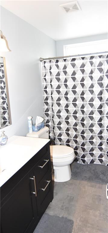 Main level bathroom with tub and shower.