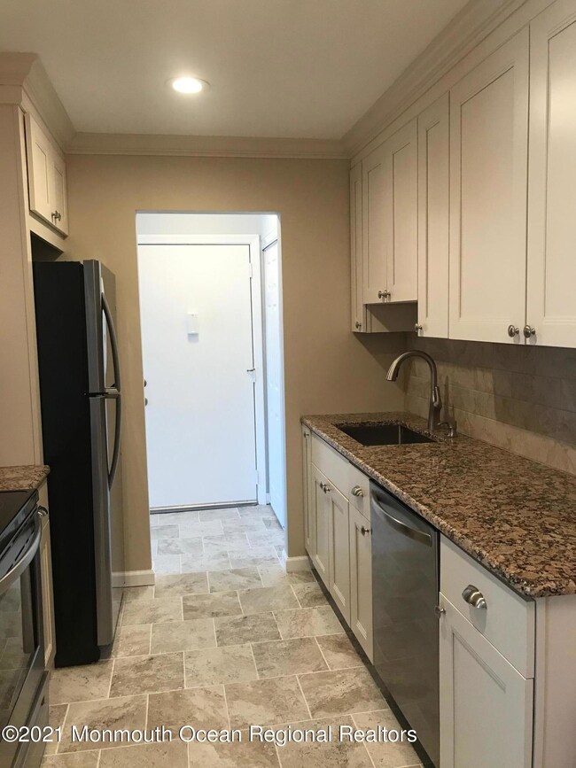 12 Pine Cluster Cir unit K, Manalapan, NJ 07726 - photo 2