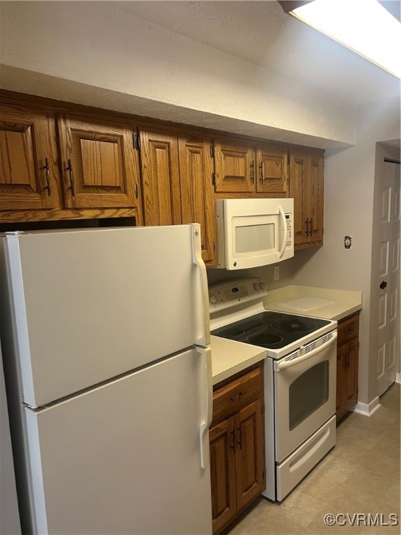 Galley style kitchen with all appliances.