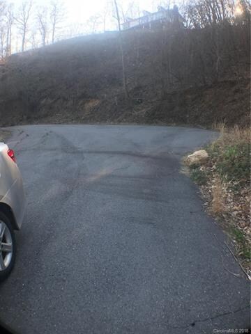 Private and secluded. Lot is at the end of the street. Paved access. City water and sewer.