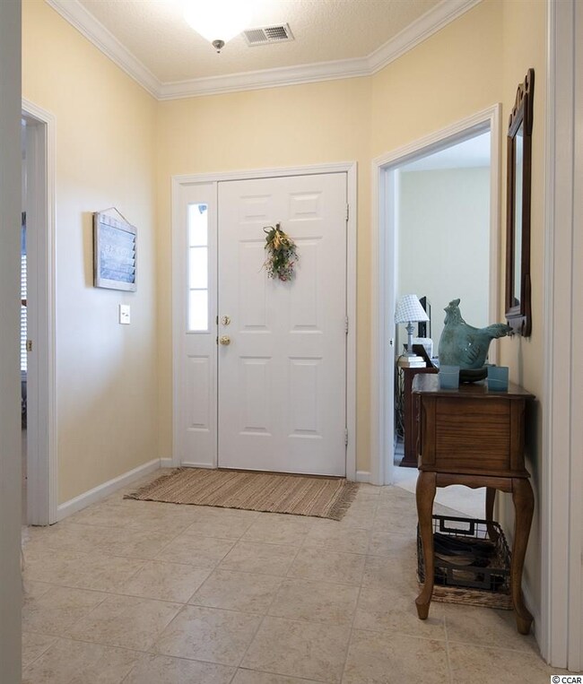 Tiled Entryway leads to two Bedrooms and 1 Bath