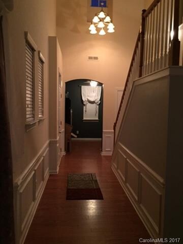 Two story foyer looking into the office/craft room