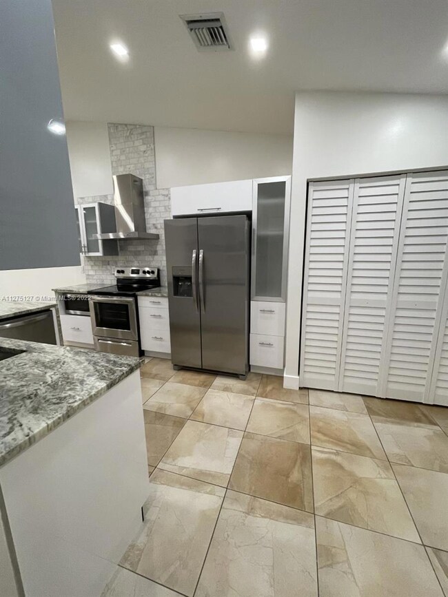 unlisted-address, Weston, FL 33331 - photo 3