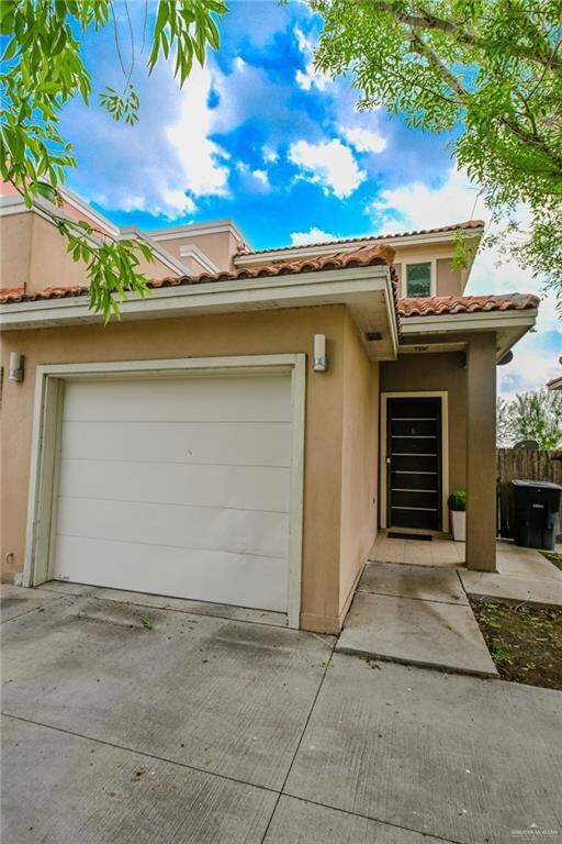 View of front of home with a garage