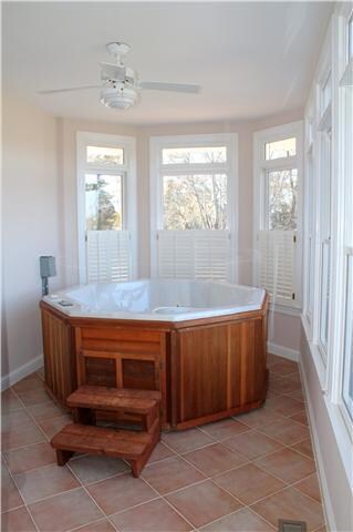 Enjoy visiting in your hot tub while looking out over your private backyard