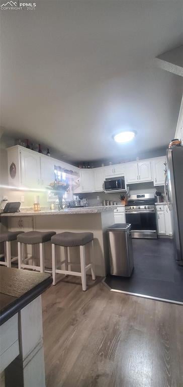 Kitchen featuring stainless steel appliances and w